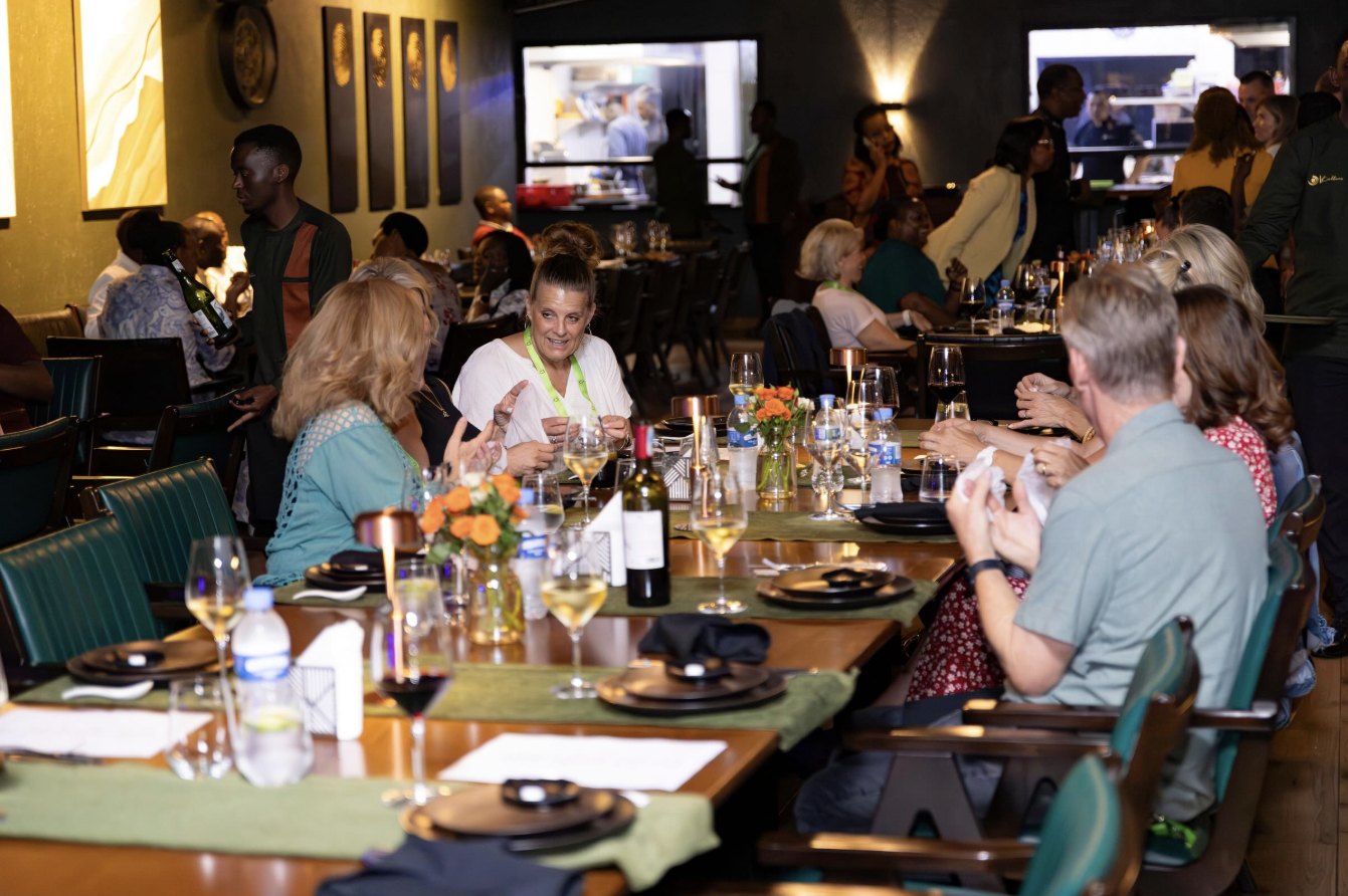 Guests at a long table during a private event at Kultura