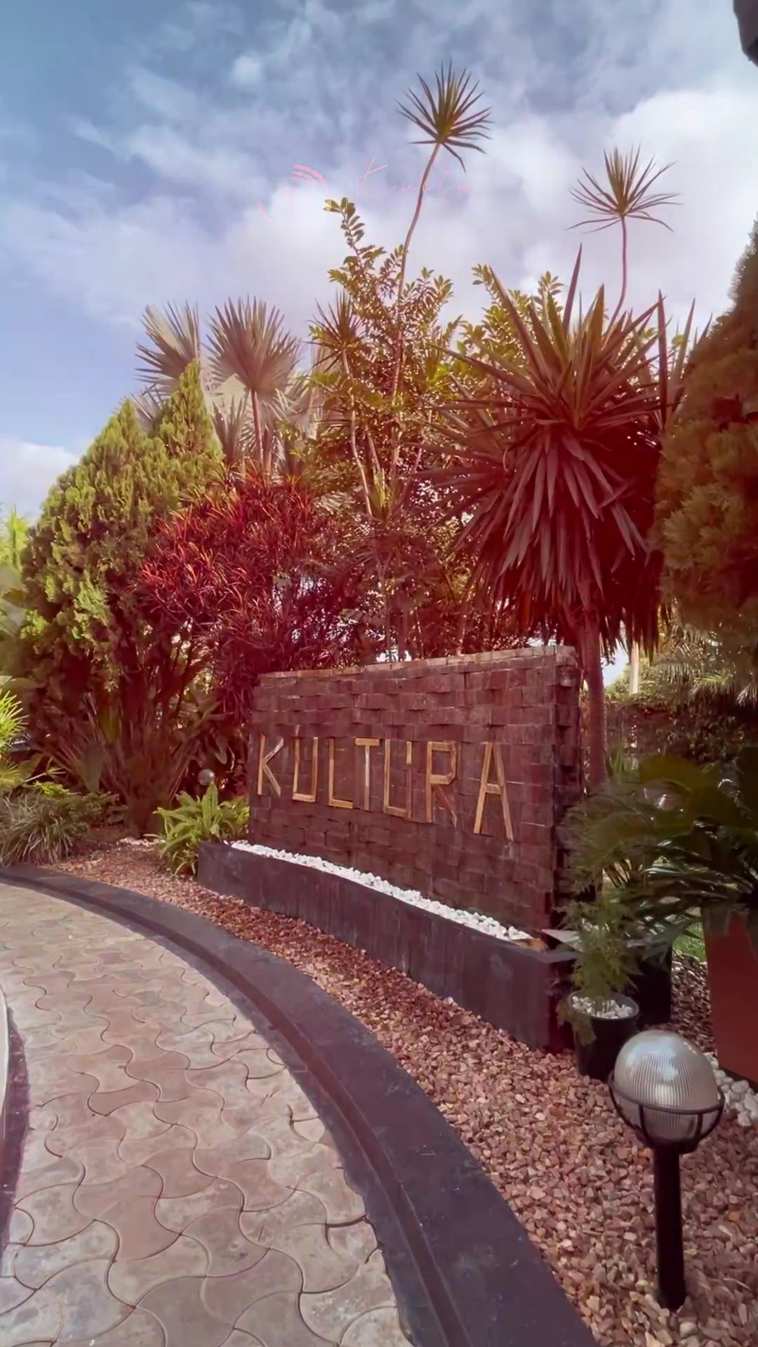 The Kultura sign at the garden entrance